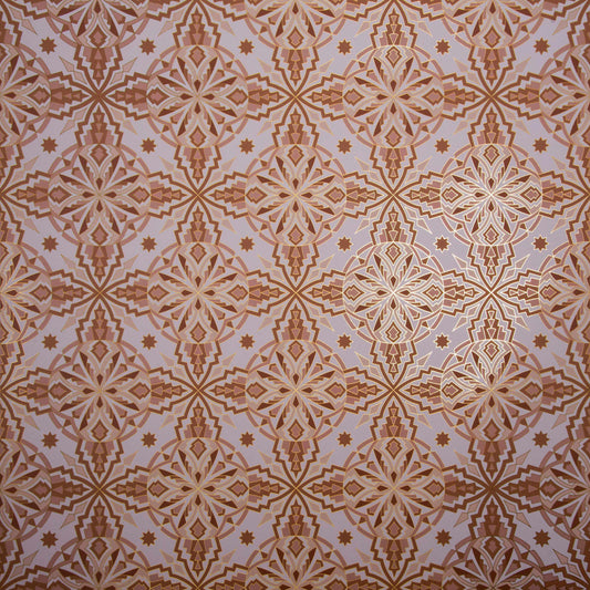 An angled close-up of the Cha Cha 'Chill' wallcovering's geometric pattern in gold and neutral tones.