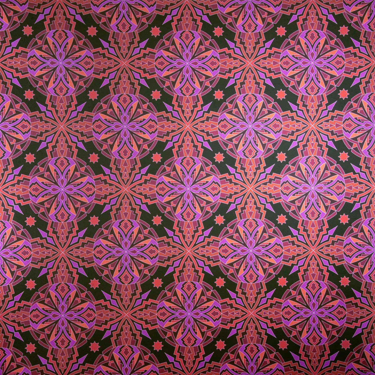 ChaCha Chill is a 1920s art deco inspired shimmering repeat geometric pattern composed of stars, diamonds, triangles, and other shapes in 70s retro pinks, reds, oranges, burgundy, on a black background and digitally printed on silver mylar.