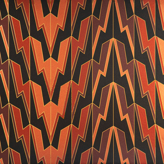 Greased Lightening Power of Love is an art deco inspired gothamesque geometric repeat pattern showcasing the lightning bolt, in black, reds, pinks, outlined in gold and printed on gold mylar