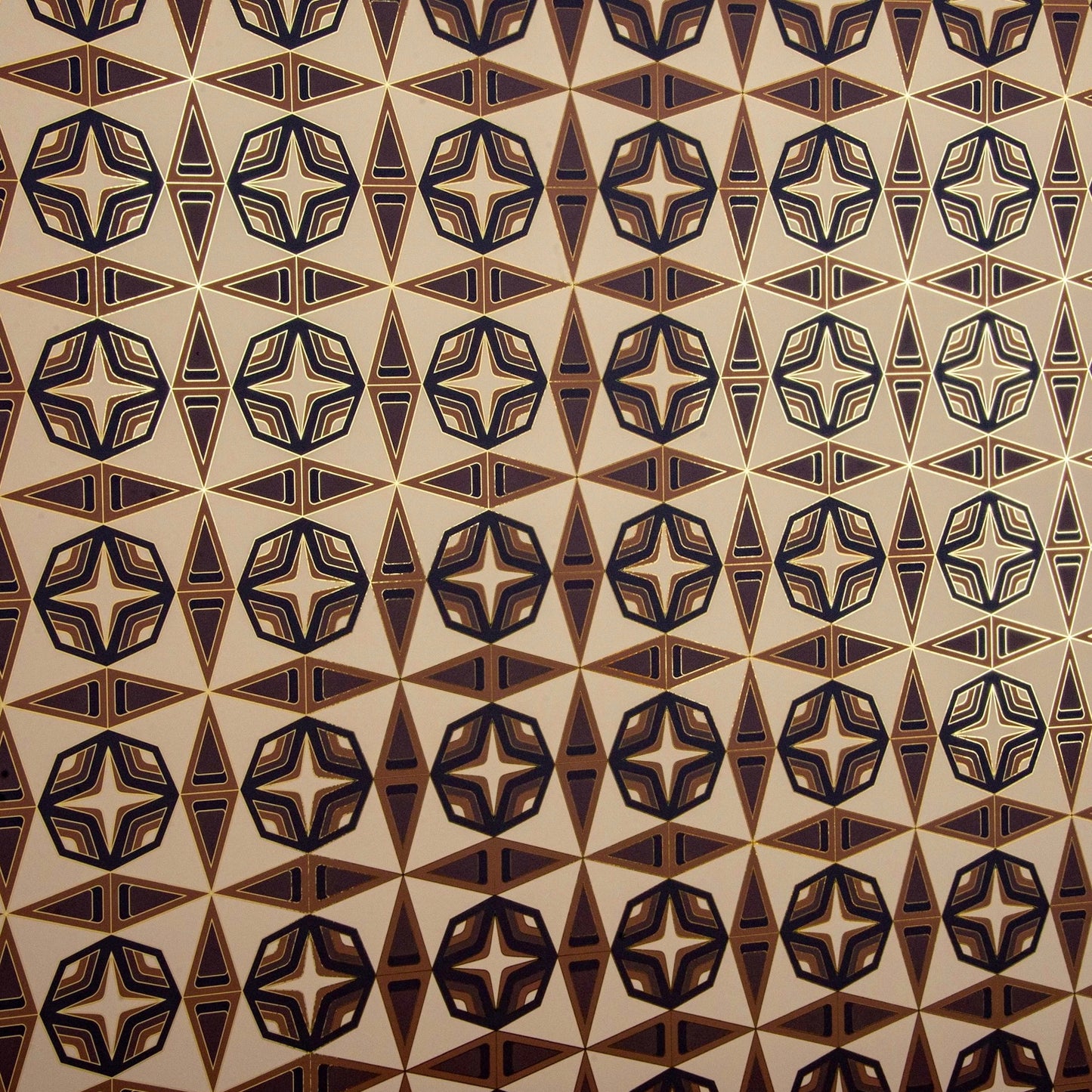 A flat-lay image of the Integratronic 'Desert' (Int) wallpaper's repeating geometric pattern.