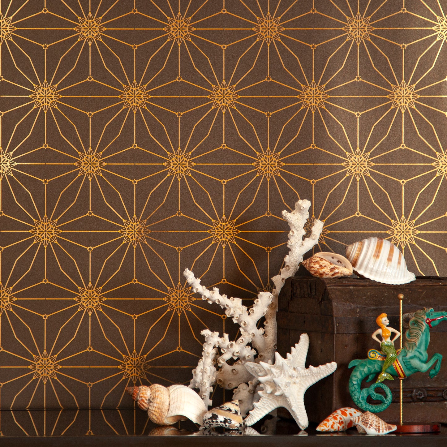 Star Guitar 'Midnight' wallcovering with seashells, coral, and nautical objects.
