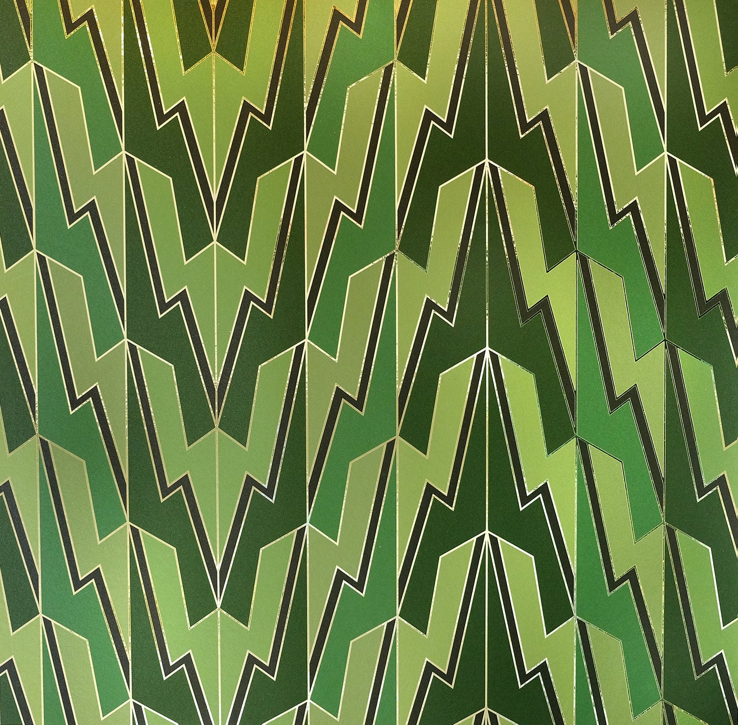 Greased Lightening Summer Storm is an art deco inspired gothamesque geometric repeat pattern wallpaper showcasing the lightning bolt, in various greens, outlined in gold and printed on gold mylar