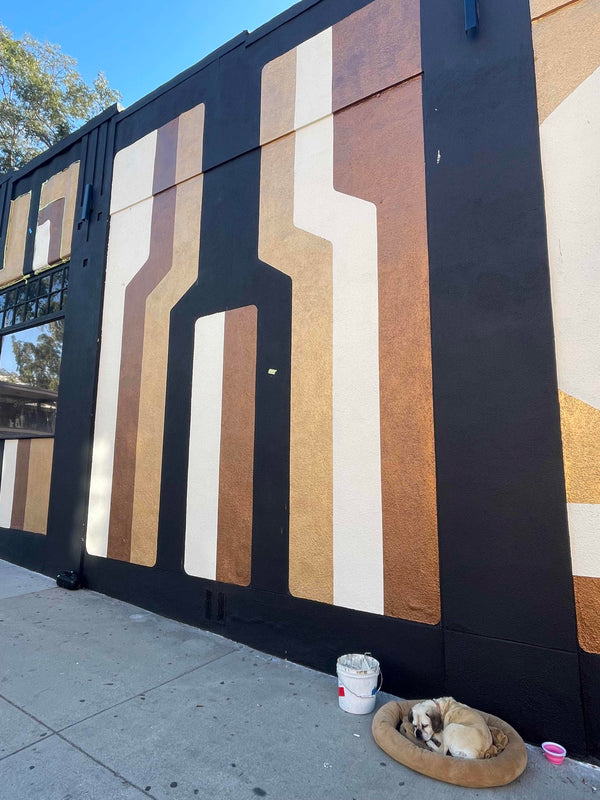 Londubh's Puggle, Lindsay Wagner, on site while they install the mural.
