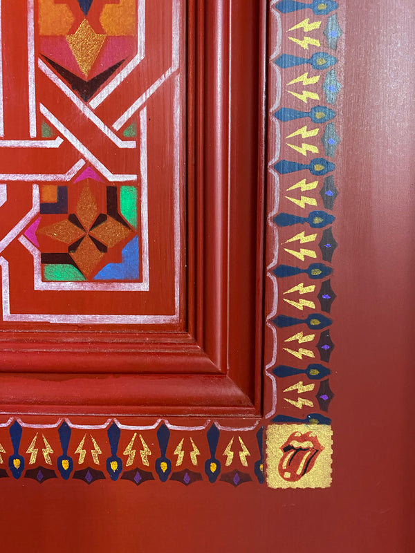 Close up on pocket door details, including corners inspired by vintage LSD blotter art.