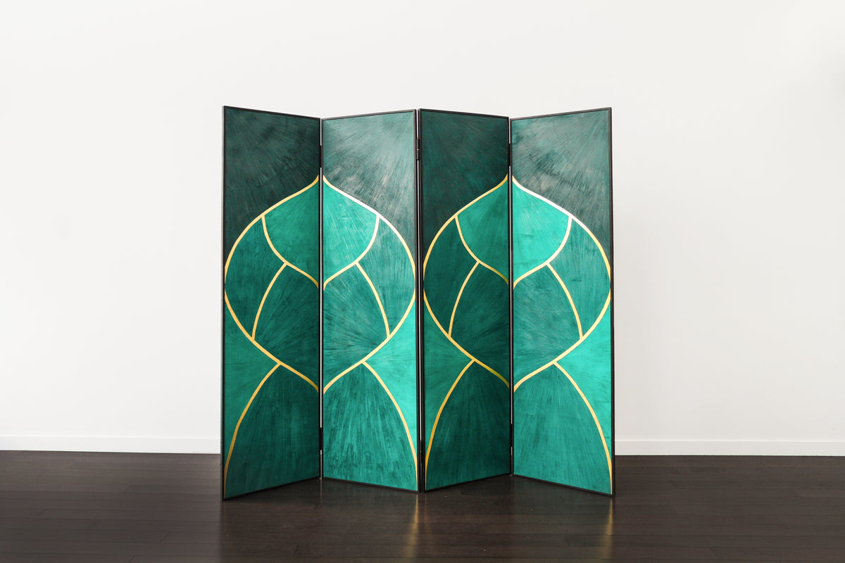 Highly pigmented in emerald jewel textured plaster in the Hollywood regency style with 24kt gold leaf on four panel screen/room divider against white wall.