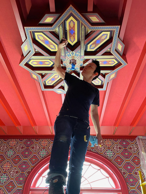 Touch ups on the ceiling medallion.