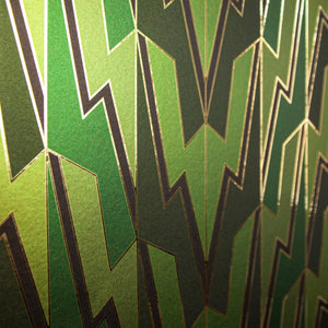 Greased Lightening Summer Storm is an art deco inspired gothamesque geometric repeat pattern showcasing the lightning bolt, in various greens, outlined in gold and printed on gold mylar 