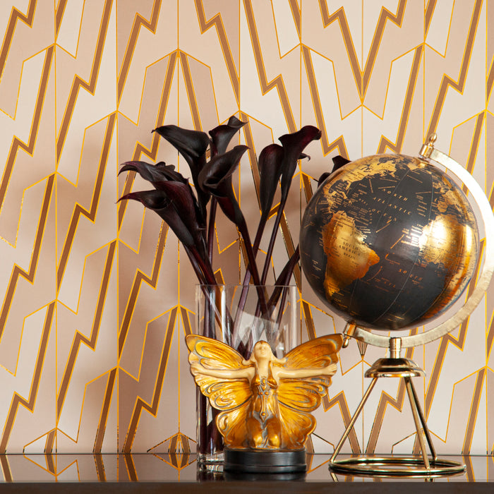Greased Lightning 'Cream Dreams' wallcovering styled with a globe and dark calla lilies.