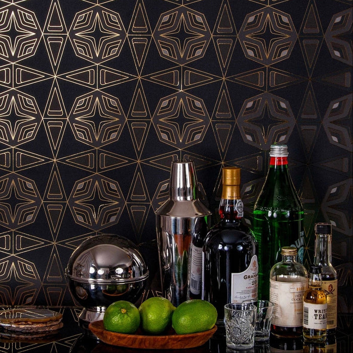 A stylish home bar scene with cocktail ingredients against Integratronic 'Night' Wallcovering.