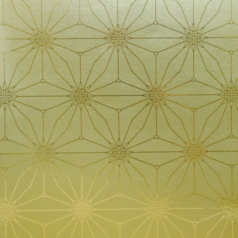 Star Guitar Dawn is a shimmering repeat moroccan inspired pattern and star motif linked together with a graphic thread in brass tone digitally printed on gold mylar