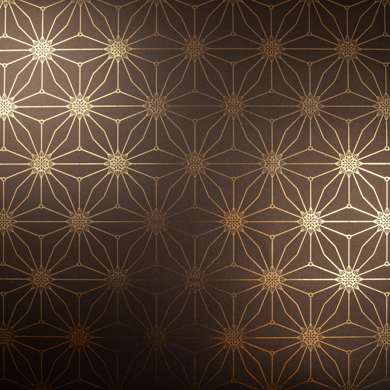 Star Guitar Night is a shimmering repeat moroccan inspired pattern and star motif linked together with a graphic thread in black digitally printed on gold mylar 
